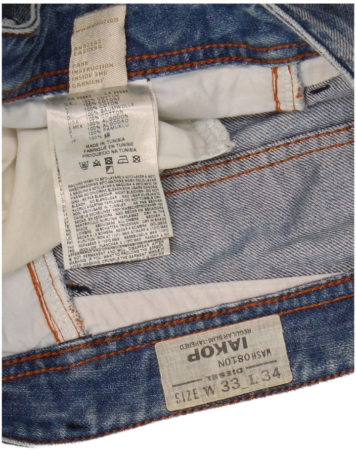 Jeans slim da uomo Diesel Iakop effetto consumato W33 L34 cotone blu