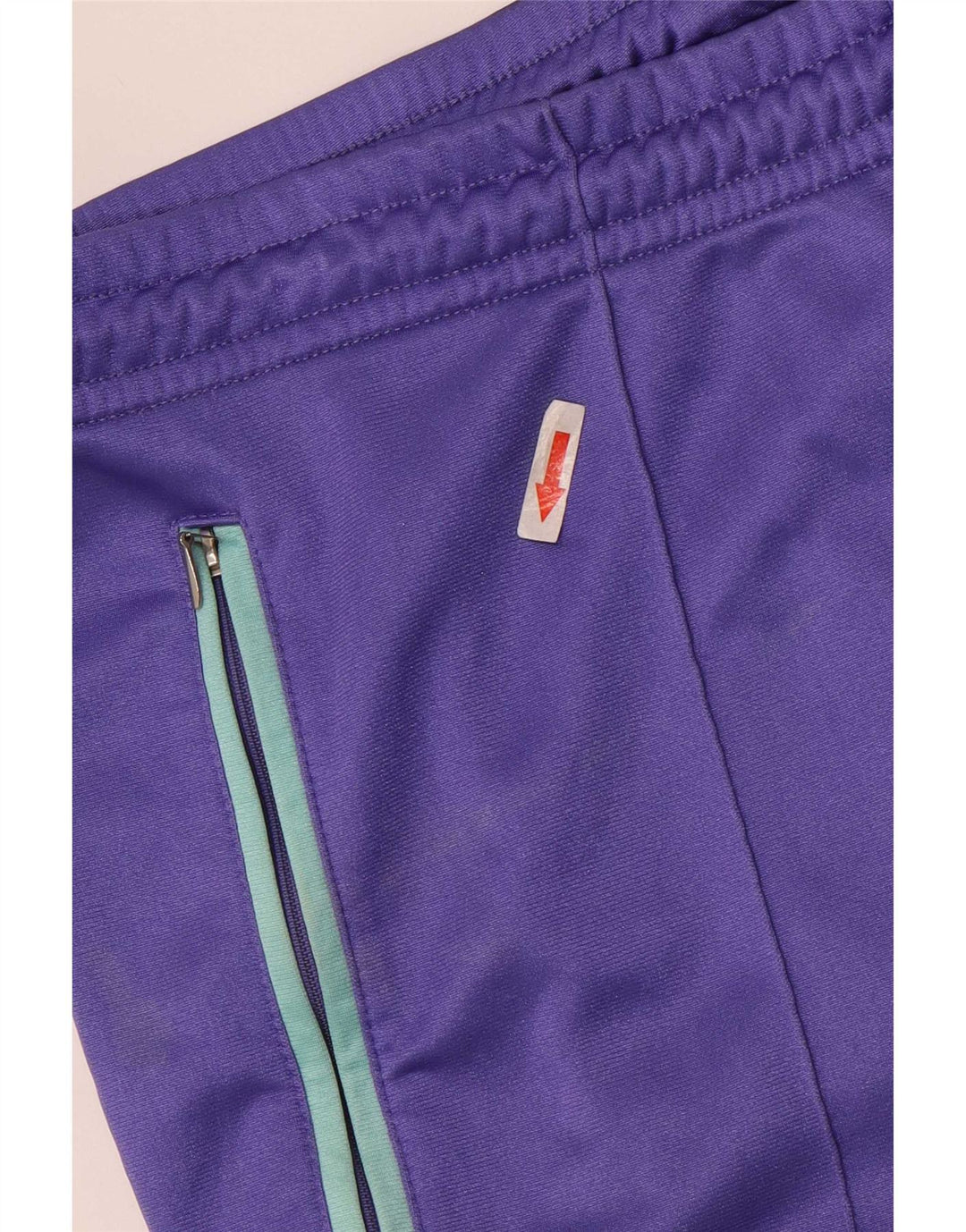 Pantaloni da tuta grafica da uomo Asics IT 50 color block viola medio