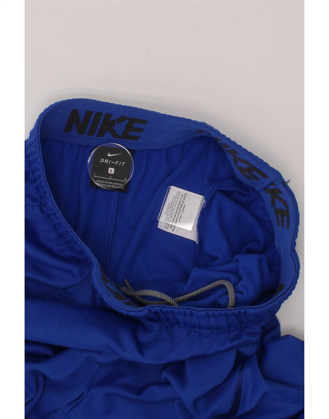 NIKE Boys Dri Fit Tracksuit Trousers 12-13 Years Large  Blue Polyester Vintage Nike and Second-Hand Nike from Messina Hembry 