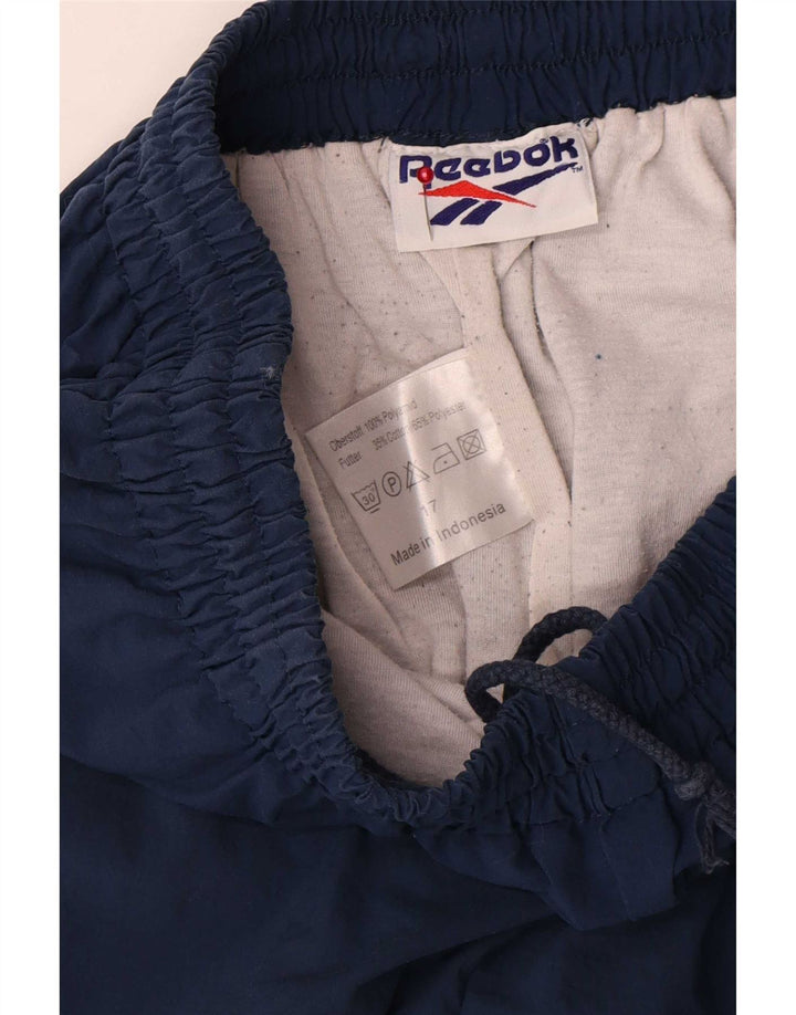 Pantaloni da tuta da uomo Reebok Joggers Medium Blu Navy Poliammide
