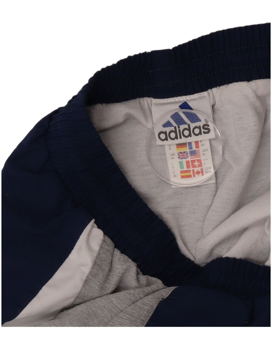 Pantaloncini sportivi da uomo Adidas Large in poliestere color block blu navy