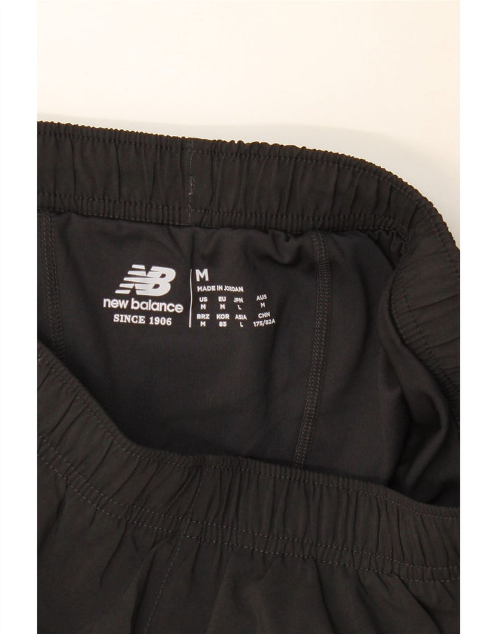 Pantaloncini sportivi da uomo New Balance medi neri