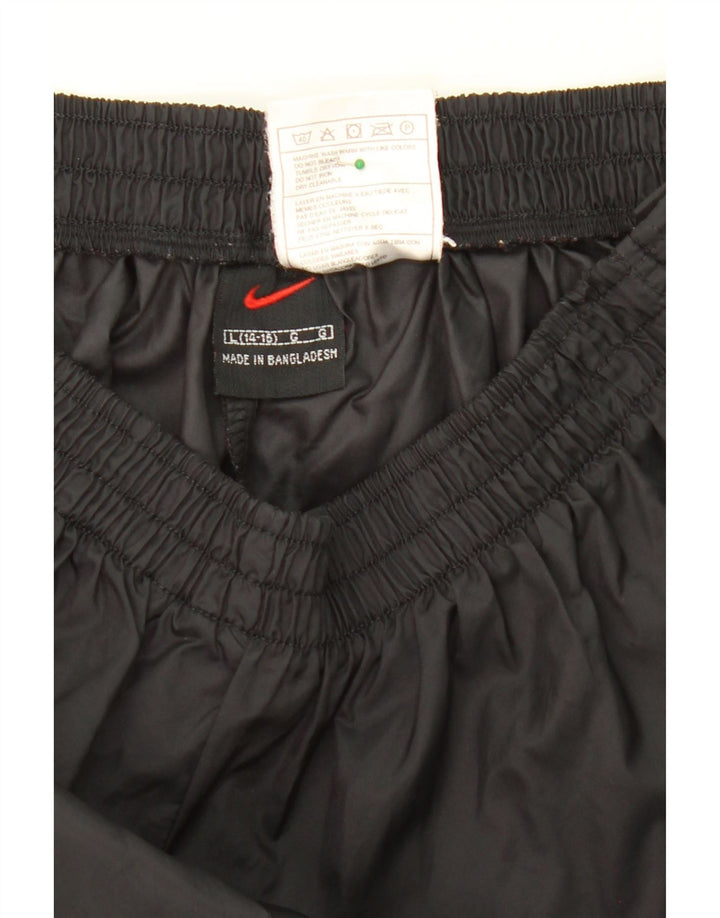 NIKE Boys Tracksuit Trousers 12-13 Years Large Black Nylon Vintage Nike and Second-Hand Nike from Messina Hembry 