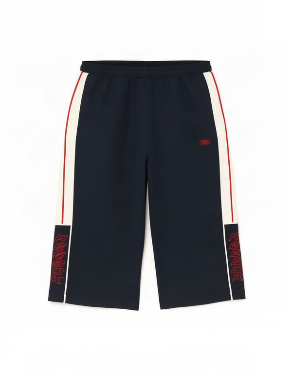 Pantaloni Reebok Graphic Windbreaker da ragazzo 15-16 anni XL Blu navy