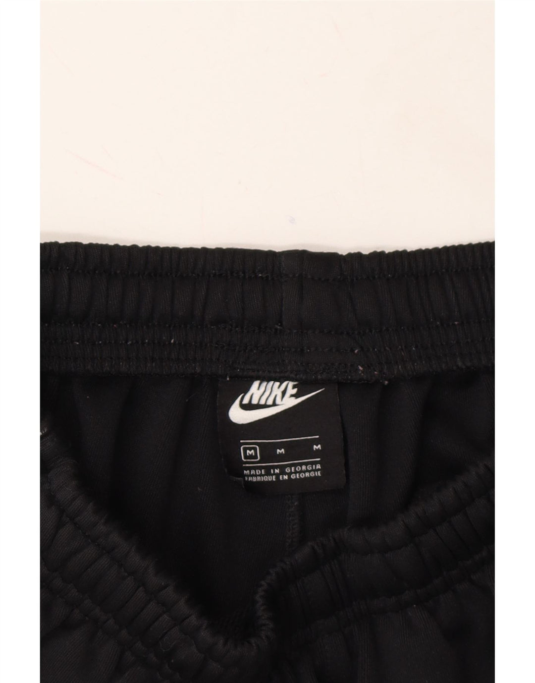 NIKE Mens Tracksuit Trousers Joggers Medium  Black Polyester Vintage Nike and Second-Hand Nike from Messina Hembry 
