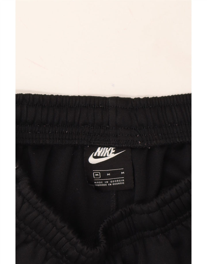 NIKE Mens Tracksuit Trousers Joggers Medium  Black Polyester Vintage Nike and Second-Hand Nike from Messina Hembry 