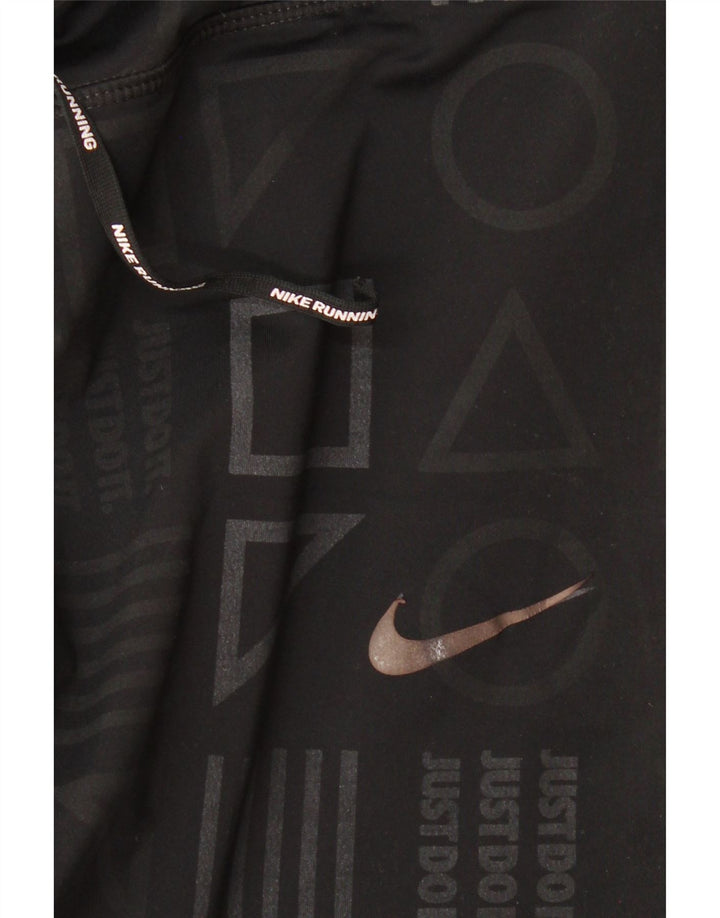 Leggings grafici Nike Dri Fit da donna UK 14 medio nero geometrico