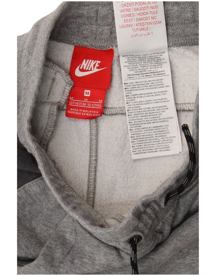 Pantaloni della tuta da ragazzo Nike Joggers 10-11 anni in cotone grigio medio