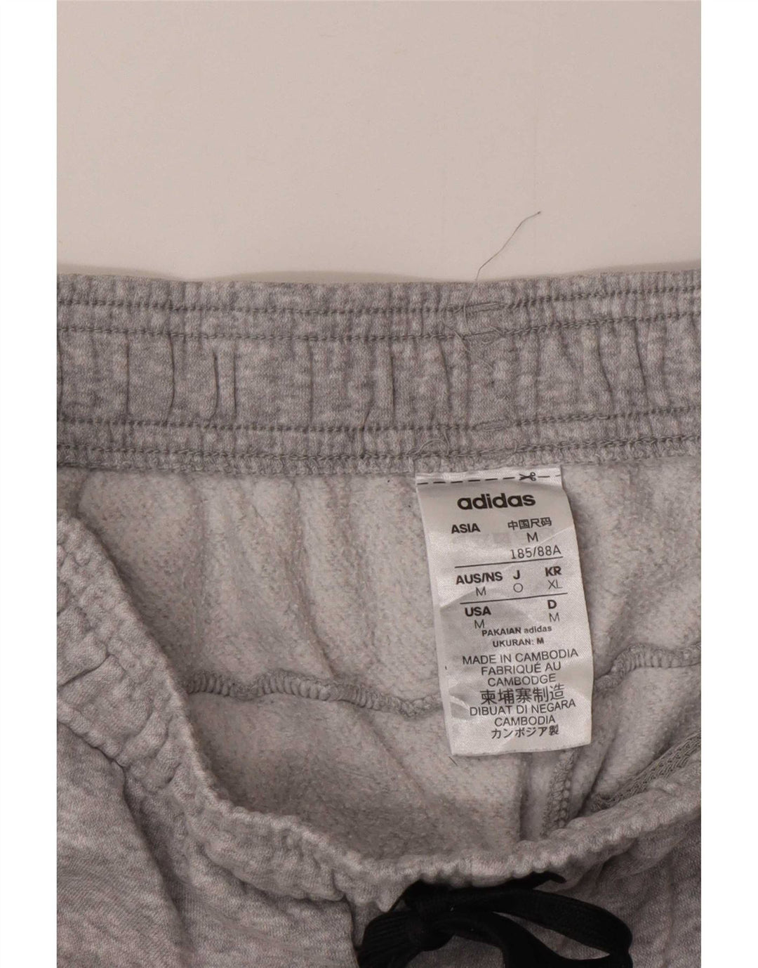Pantaloni da tuta da uomo Adidas Joggers in cotone chiazzato grigio medio