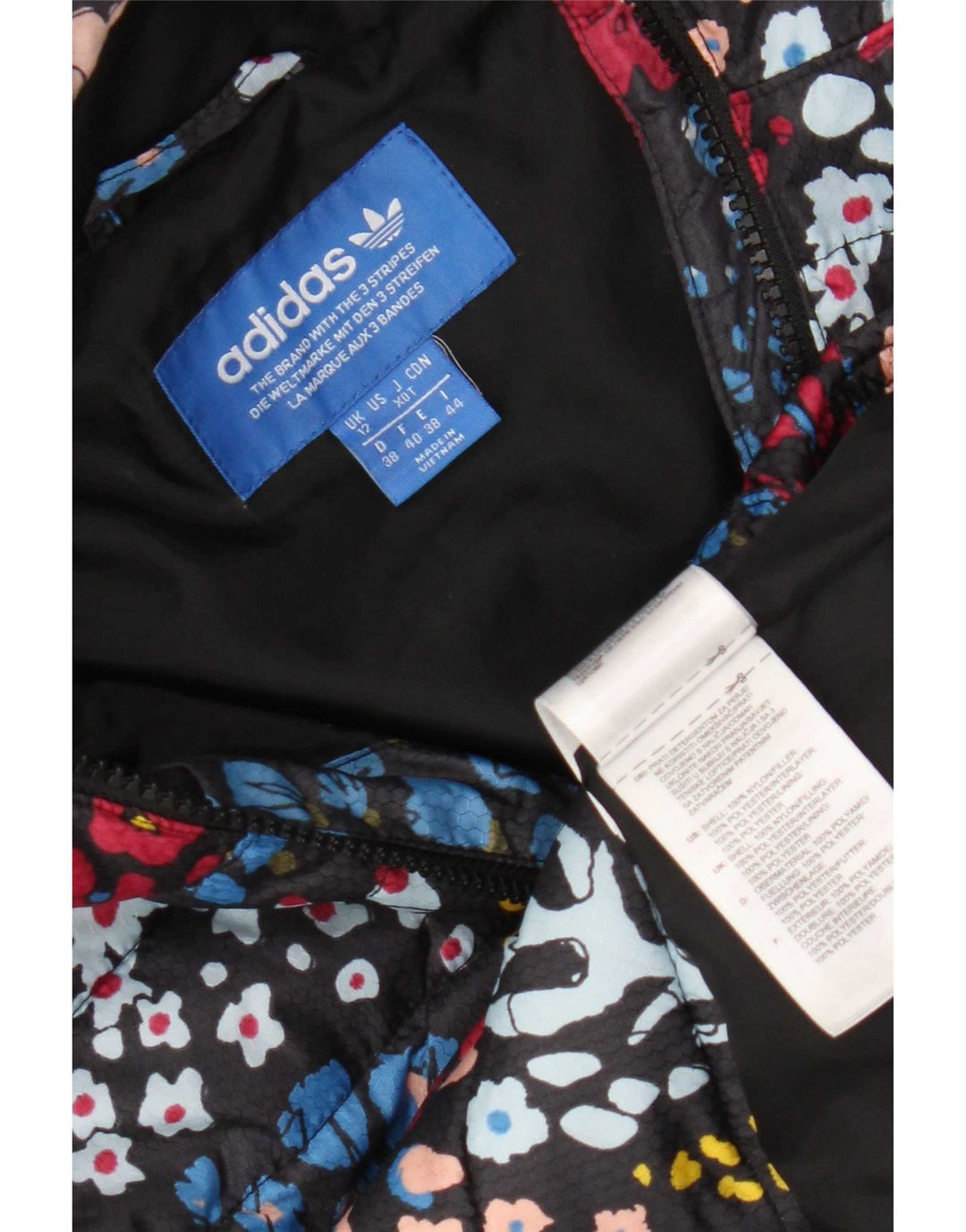 Giacca imbottita con cappuccio da donna Adidas UK 12 nylon floreale multicolore medio