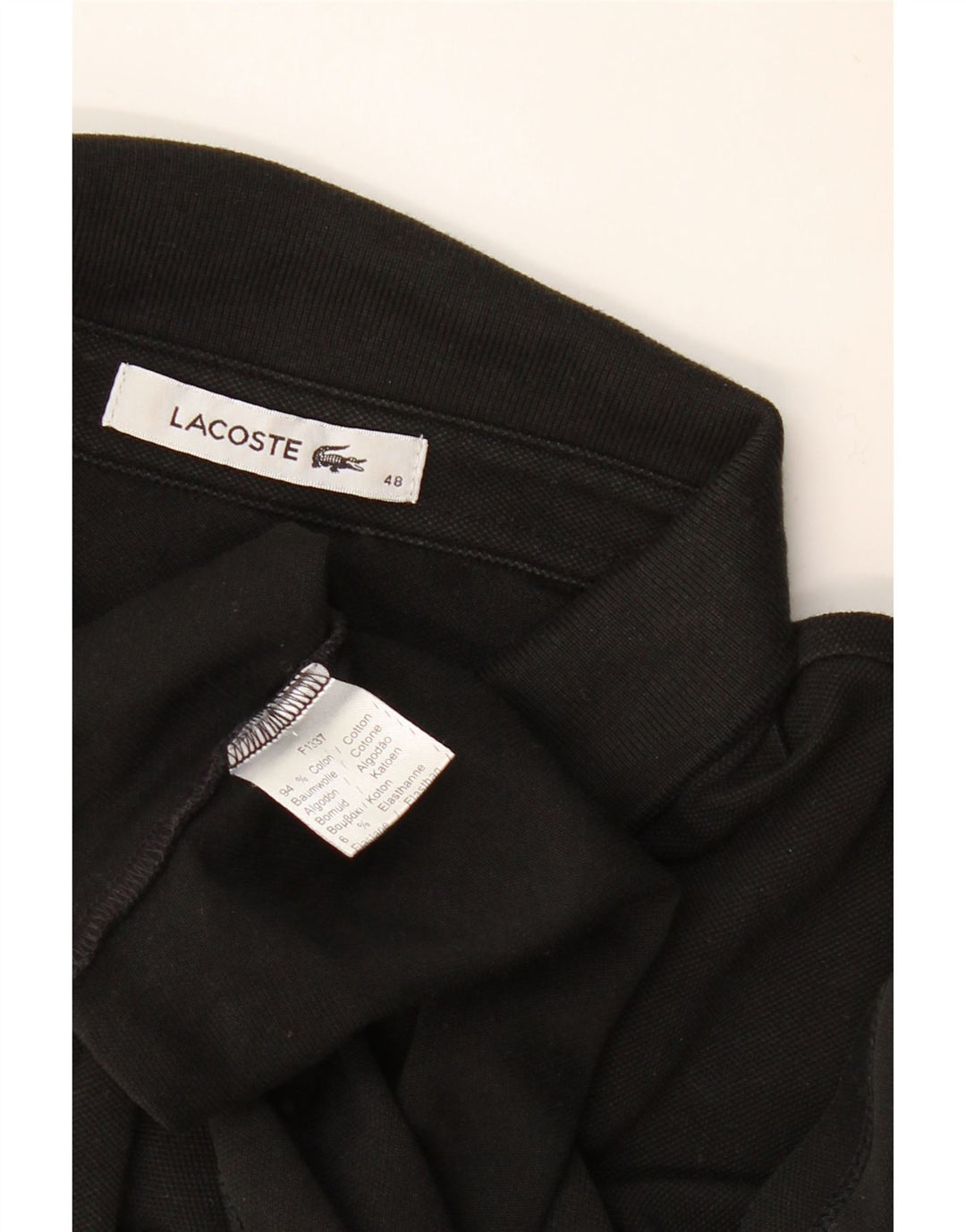 Polo da donna Lacoste taglia 48 XL in cotone nero