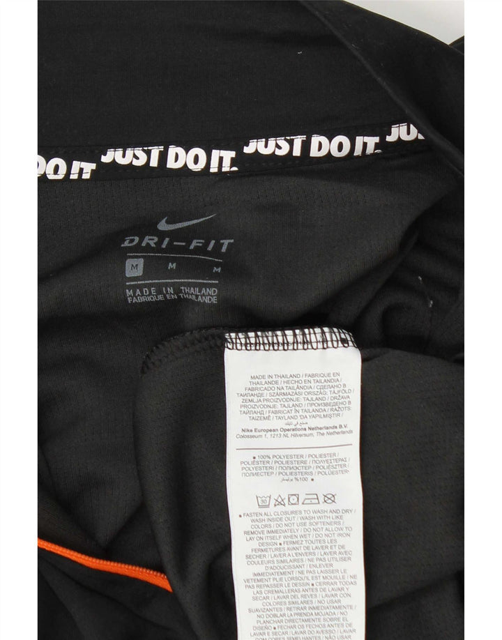 Top della tuta da ginnastica Nike da donna con collo e zip UK 14 Medium Black Colourblock