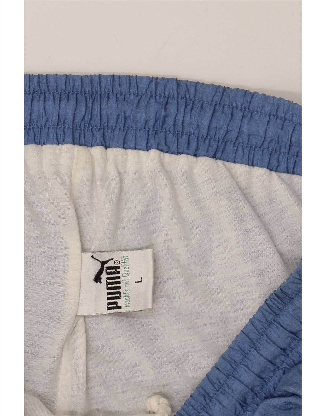 PUMA Mens Tracksuit Trousers Joggers Large Blue Colourblock Polyester Vintage Puma and Second-Hand Puma from Messina Hembry 