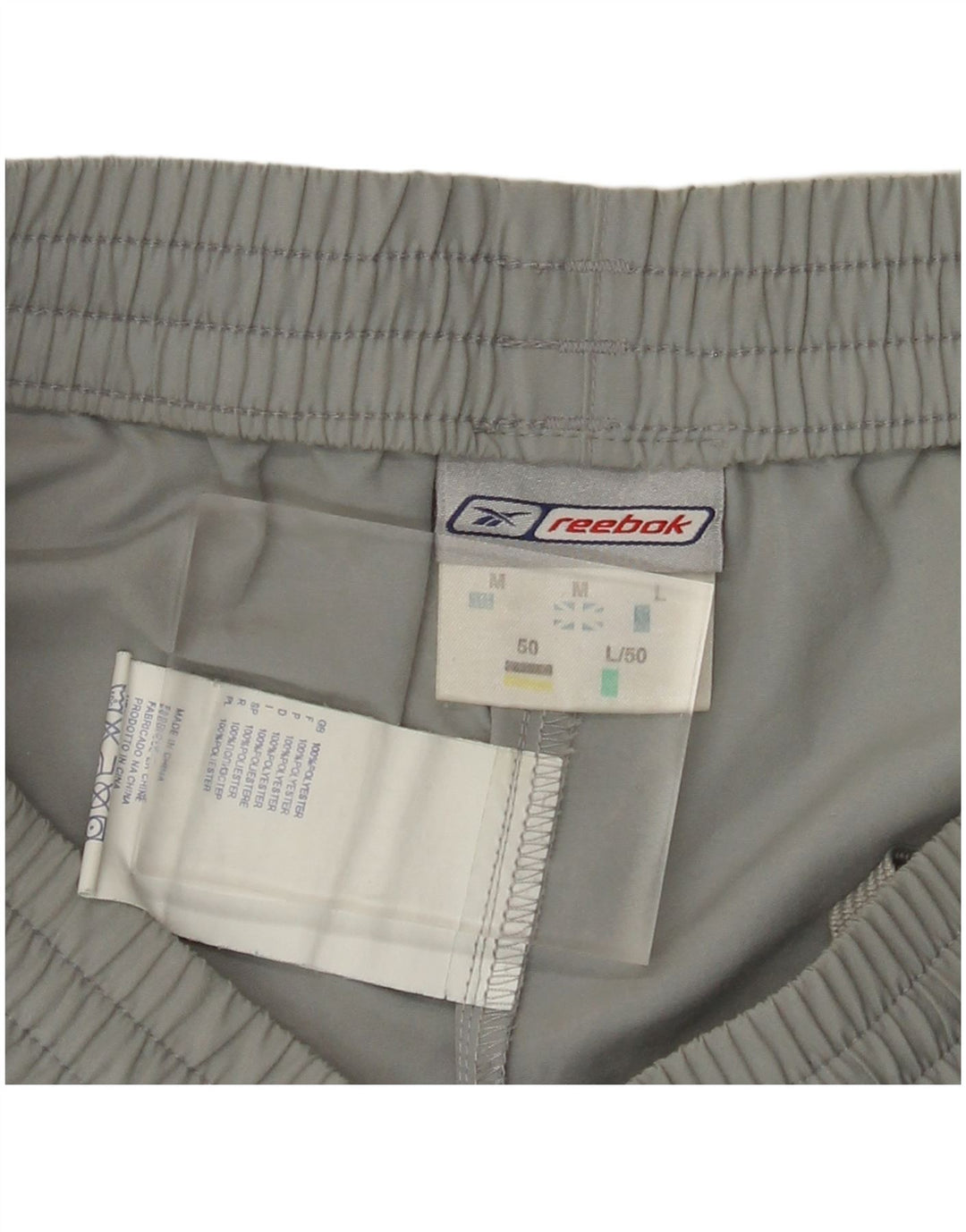 Pantaloncini sportivi REEBOK da uomo in poliestere grigio medio
