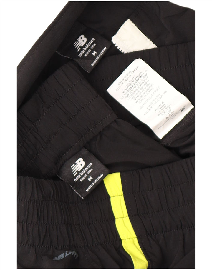 Tuta intera da uomo con grafica New Balance, poliestere color block medio nero