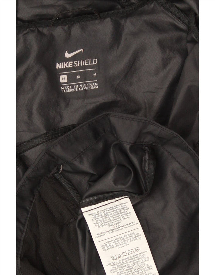 Giacca antipioggia con cappuccio da donna Nike UK 14 Medium Black Poliestere Sports