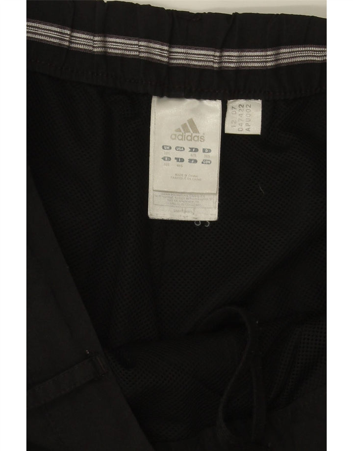 Pantaloni da tuta da donna Adidas a gamba larga UK 12 Medium Nero Poliestere