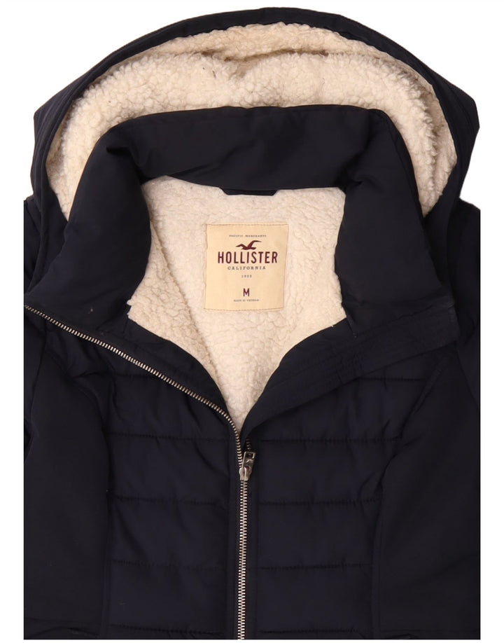 Giacca imbottita in sherpa con cappuccio Hollister da donna UK 14 medio blu navy