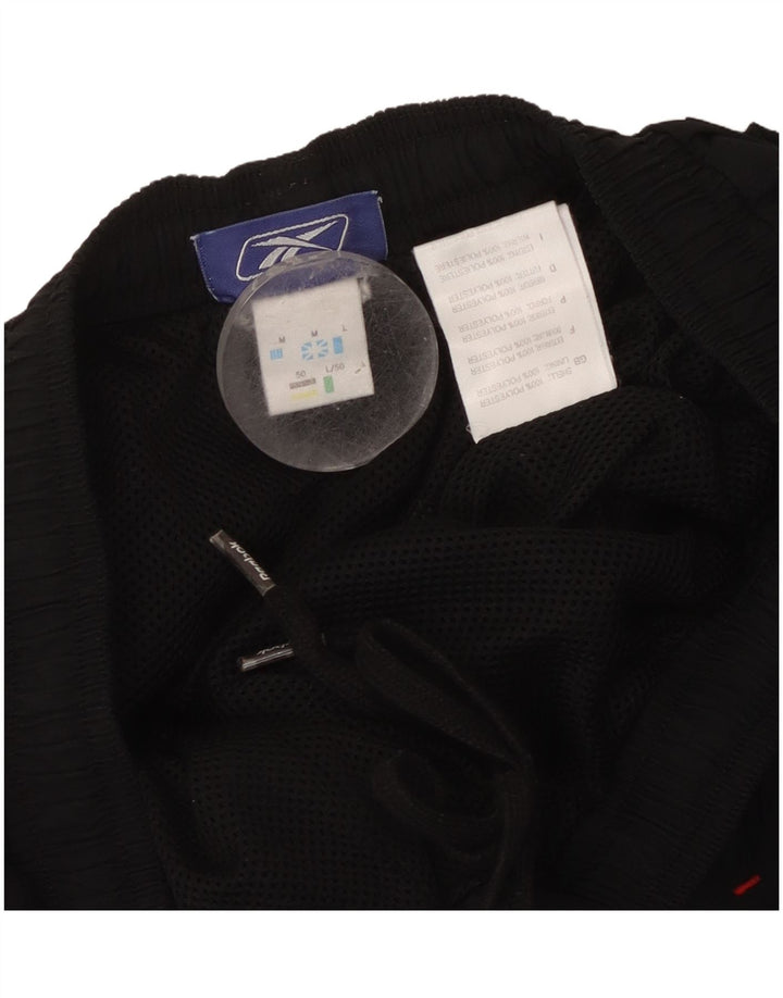 Pantaloni da tuta Reebok Capri da uomo, poliestere nero medio