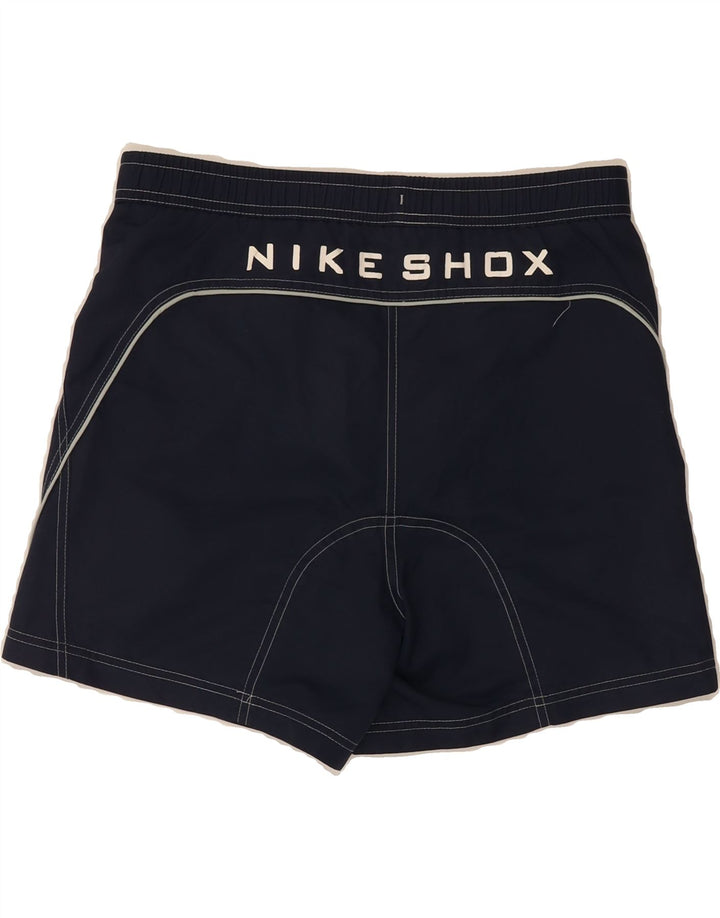 NIKE Boys Graphic Sport Shorts 12-13 Years Large Navy Blue Vintage Nike and Second-Hand Nike from Messina Hembry 
