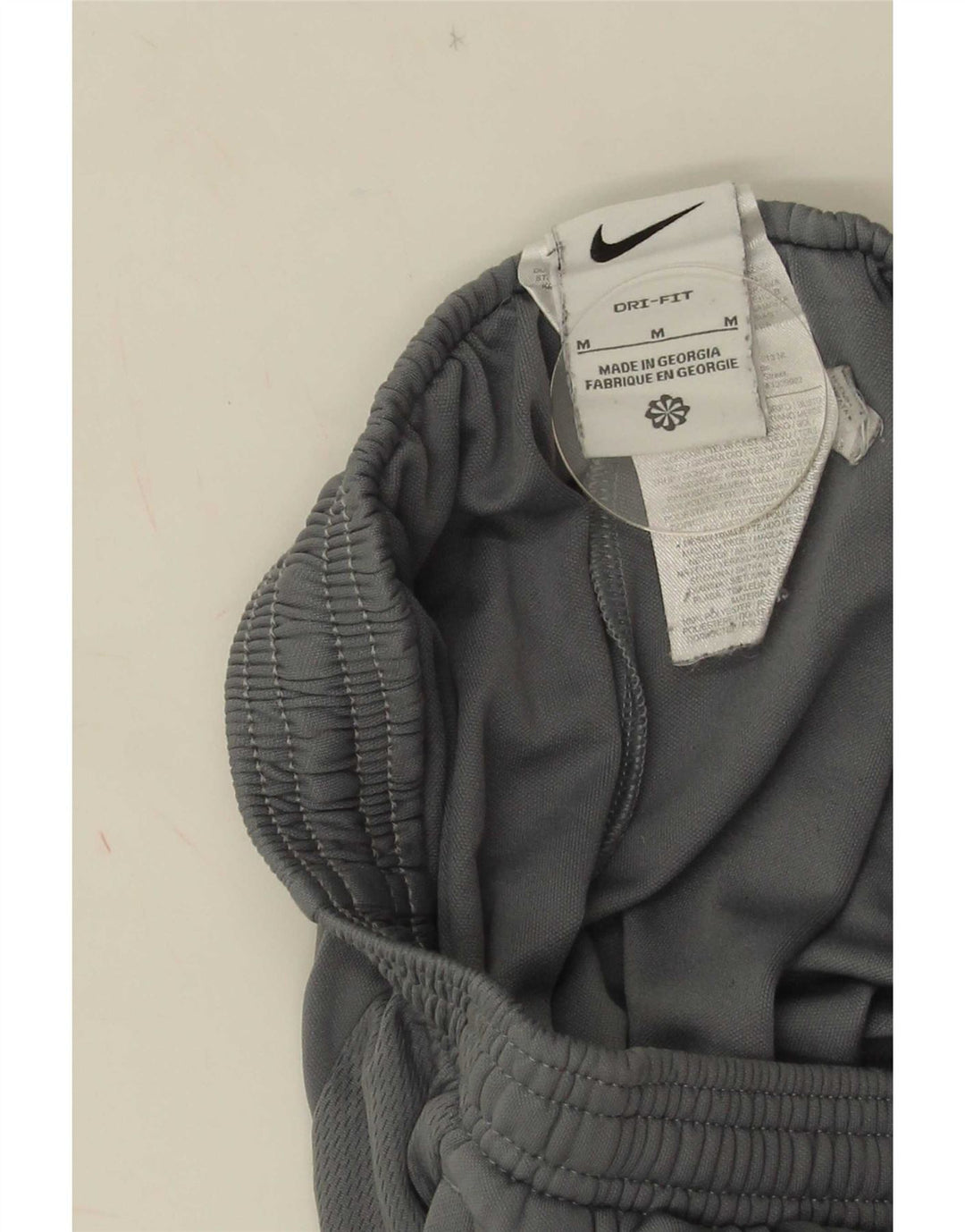 Pantaloni da tuta Nike Dri Fit da donna UK 14 Poliestere grigio medio