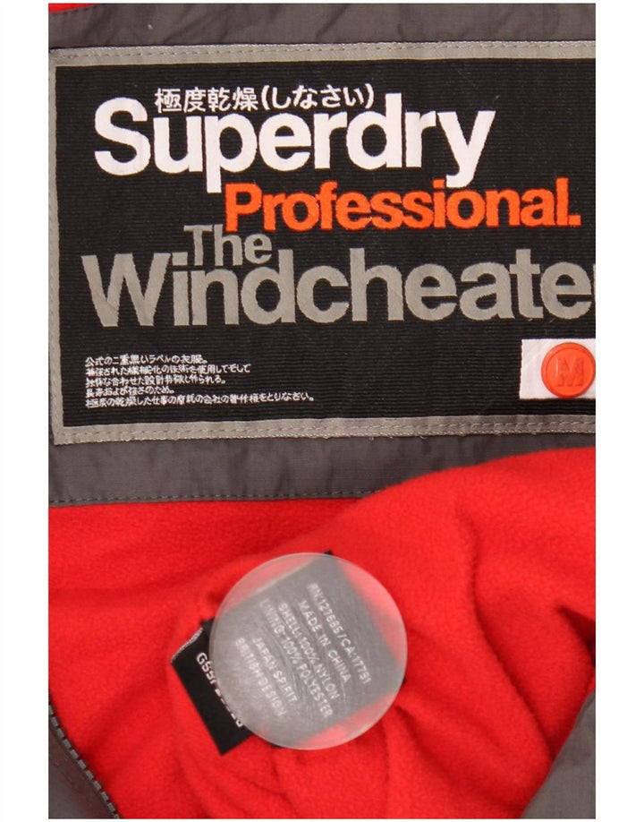 Giacca a vento grafica da donna Superdry UK 12 grigio medio