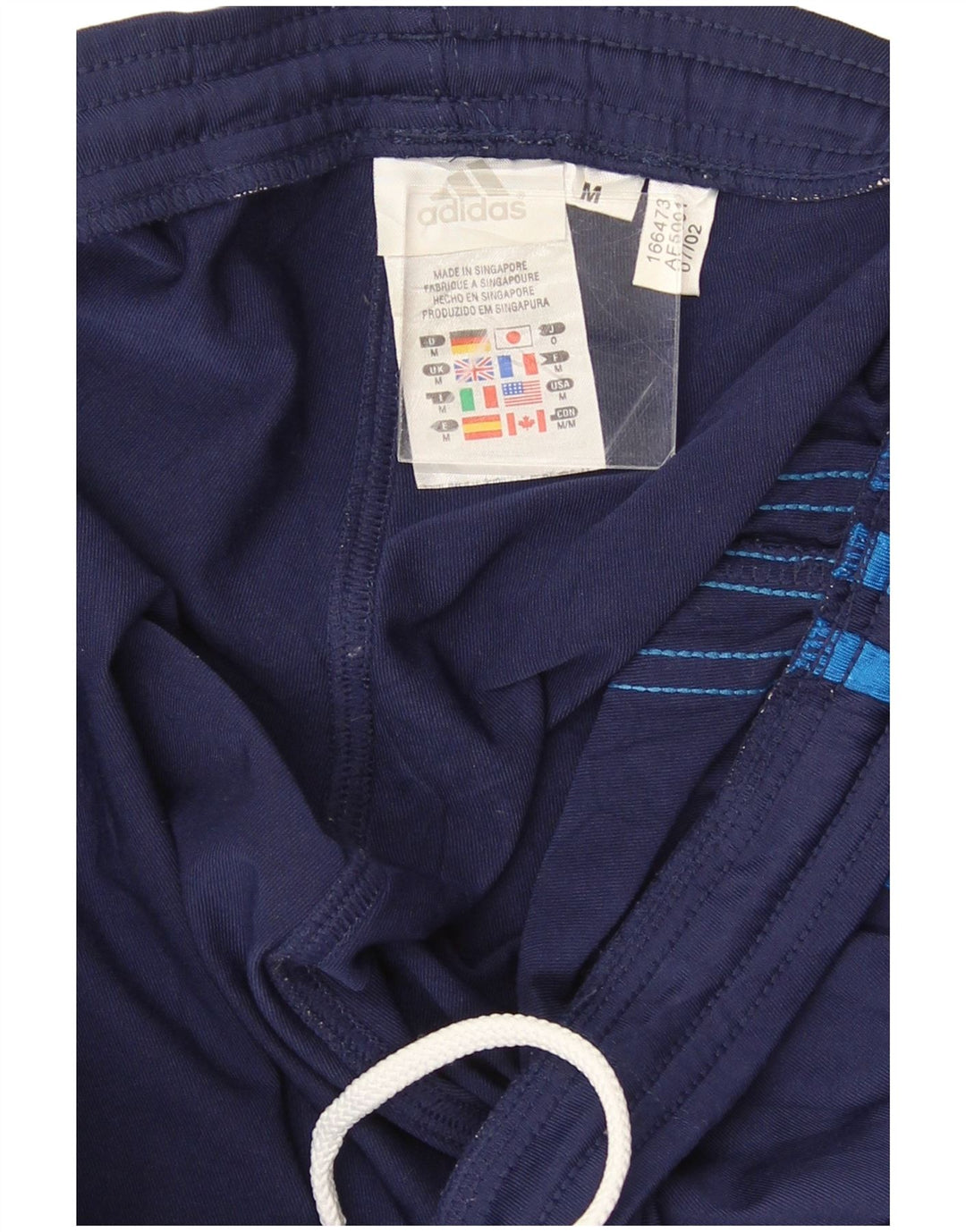 Pantaloni da tuta da uomo Adidas medi in poliestere blu navy