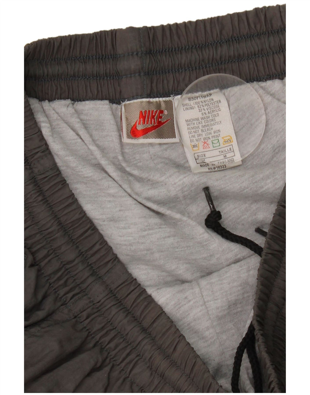 Pantaloni da tuta da uomo Nike Joggers in nylon grigio medio