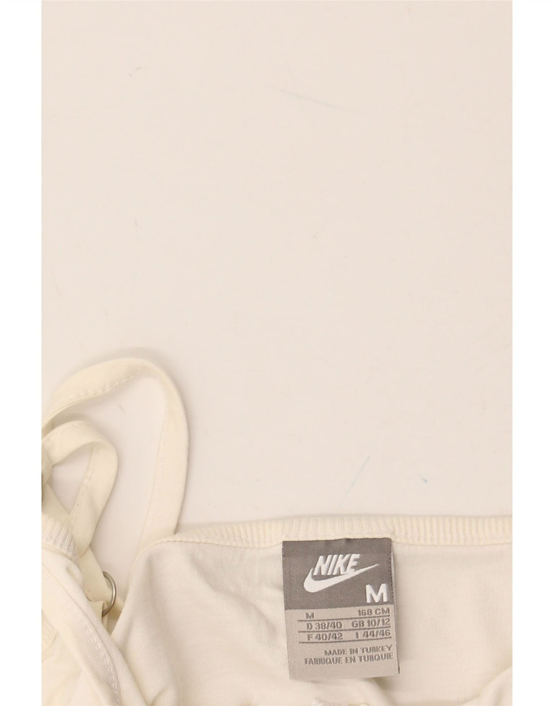 Top corto con grafica NIKE da donna UK 10/12 medio bianco sporco