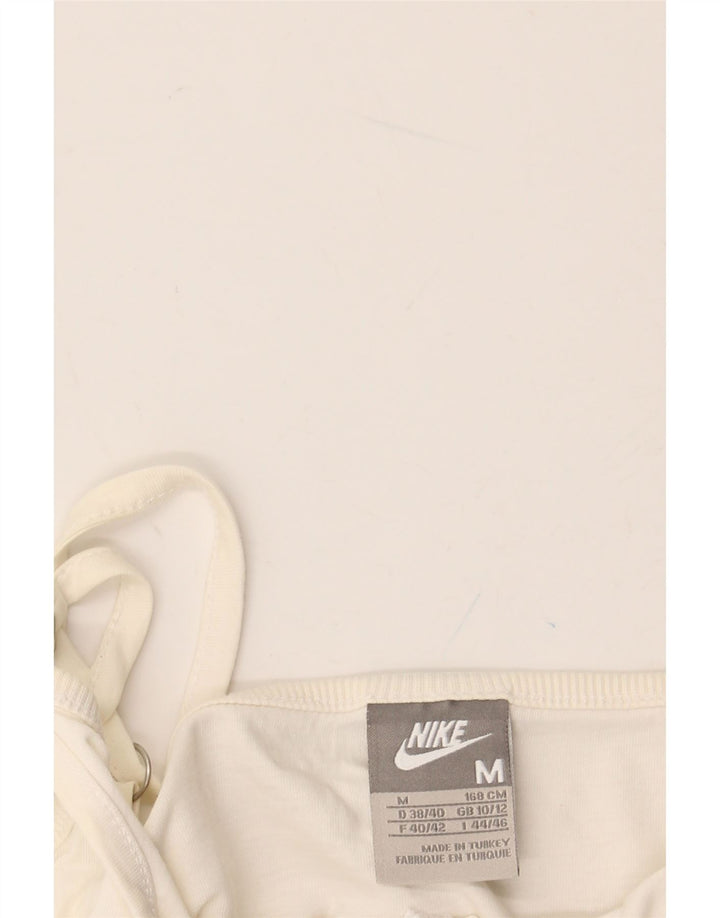 Top corto con grafica NIKE da donna UK 10/12 medio bianco sporco