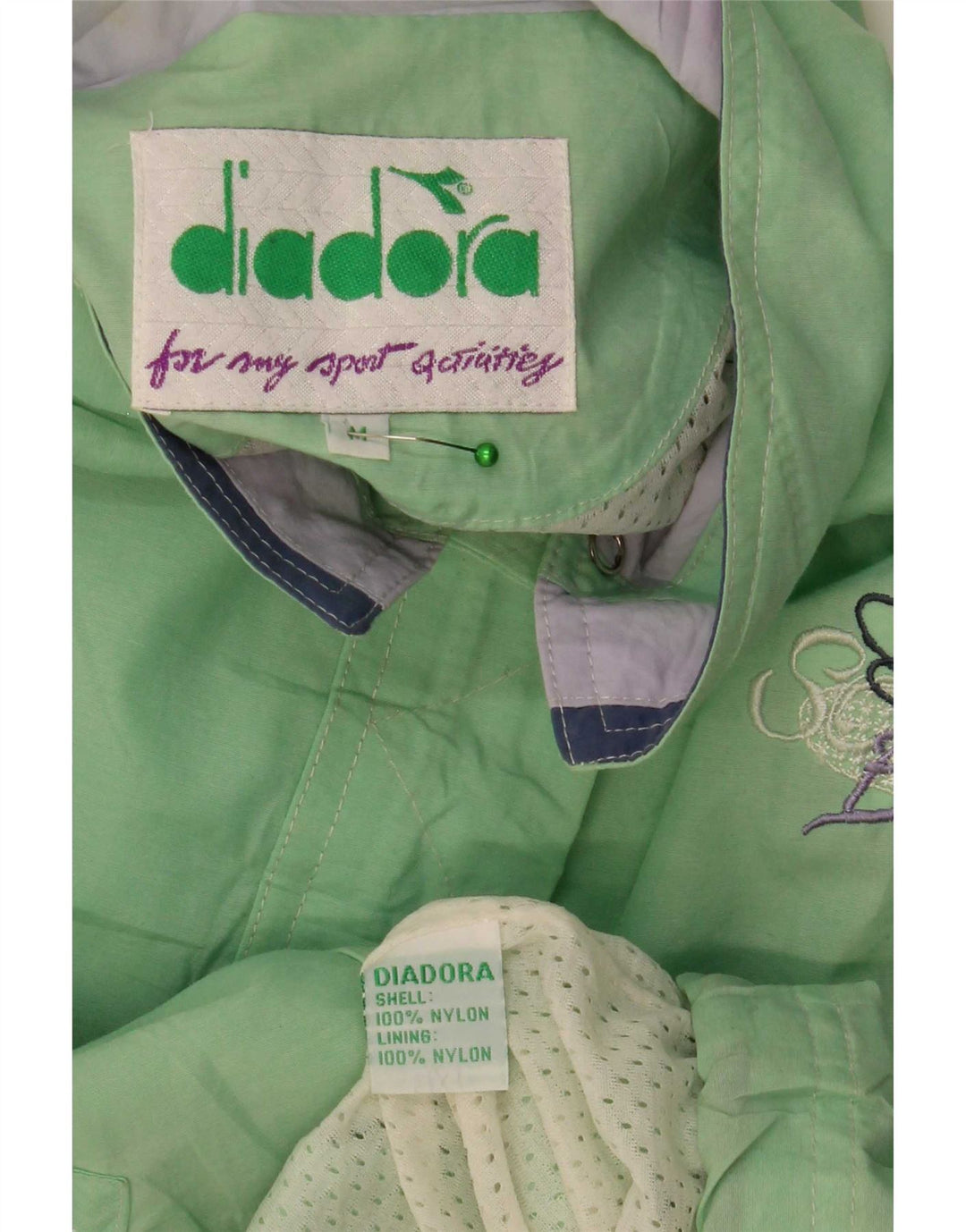 Giacca antipioggia oversize da donna Diadora UK 14 nylon verde medio