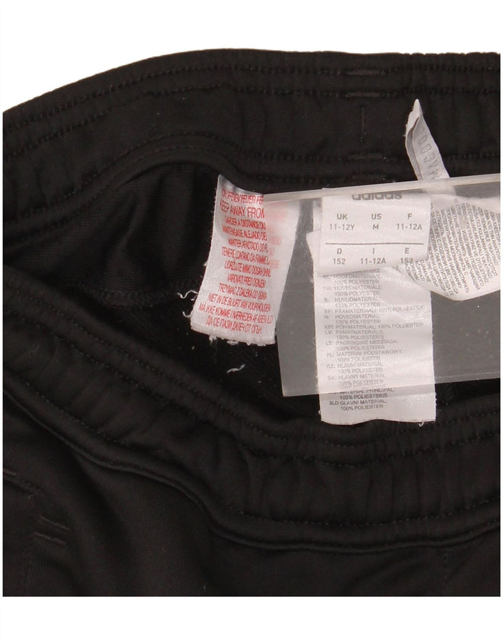 Pantaloni della tuta ADIDAS da ragazzo del Real Madrid 11-12 anni in poliestere nero