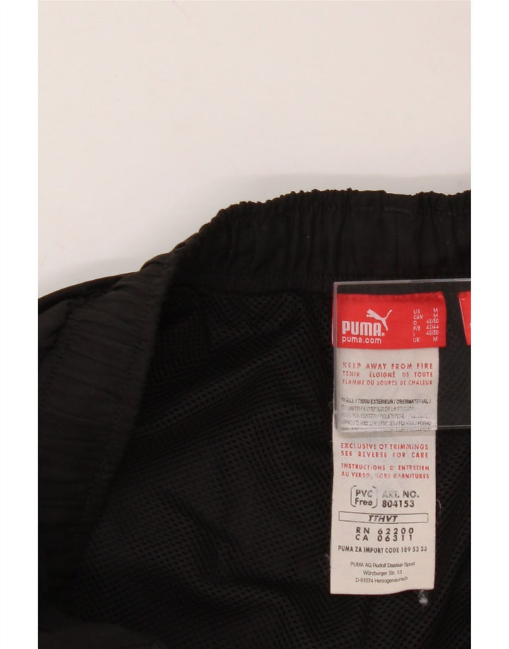 PUMA Mens Graphic Capri Tracksuit Trousers Medium  Black Polyester Vintage Puma and Second-Hand Puma from Messina Hembry 