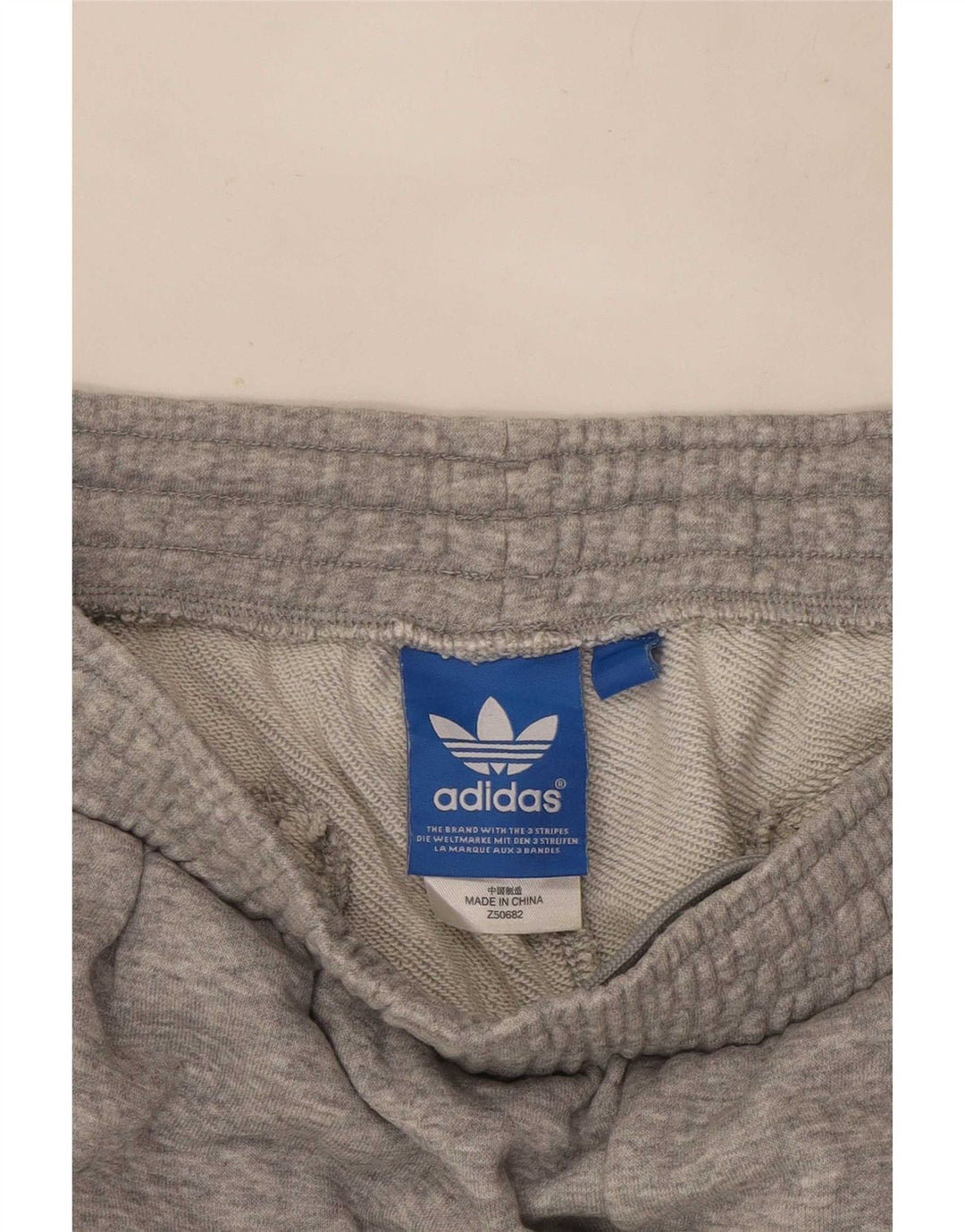 Pantaloni da tuta da uomo Adidas Capri Joggers in cotone chiazzato grigio medio
