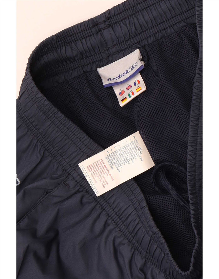 Pantaloni da tuta Reebok da uomo con grafica Capri Small blu navy color block