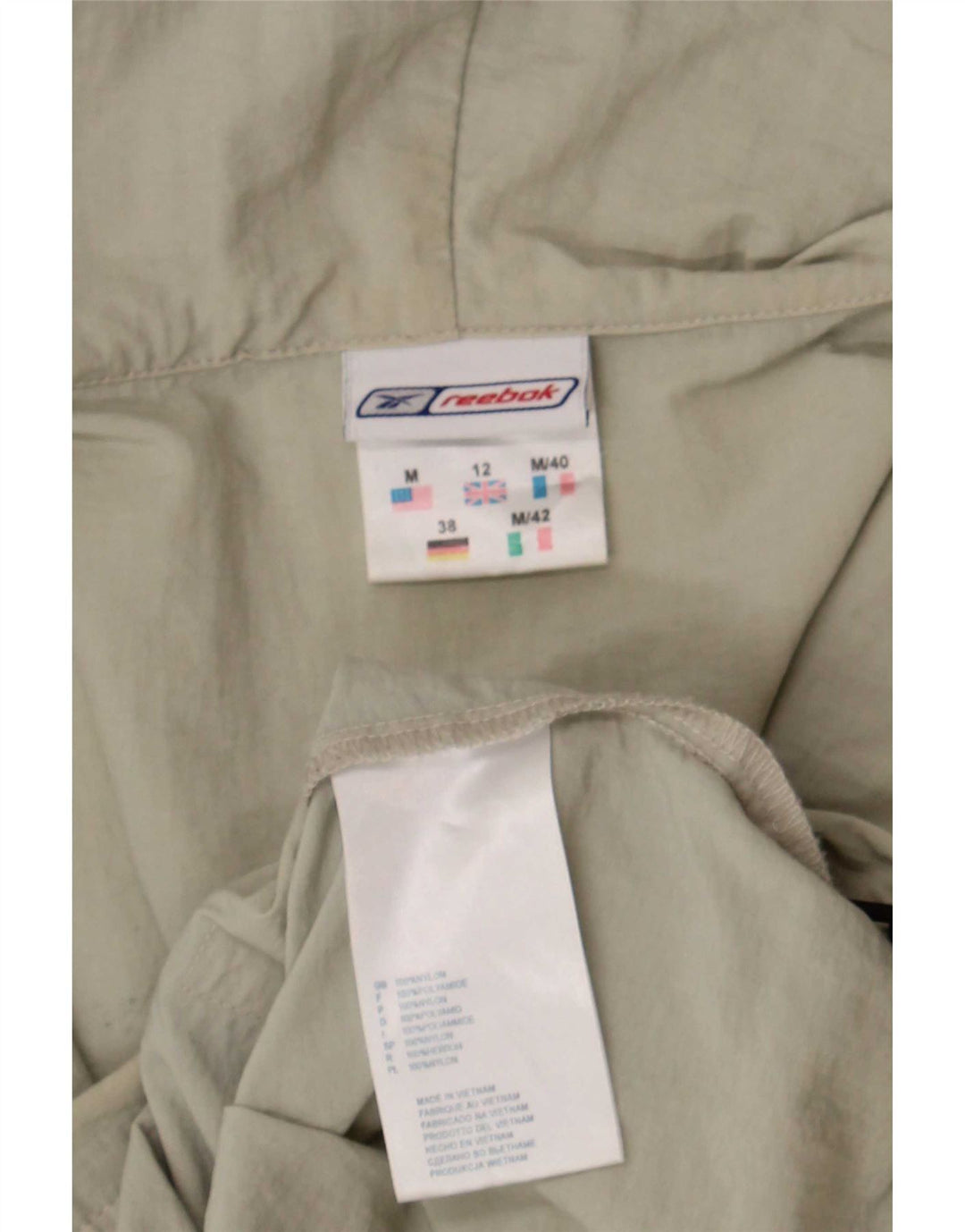 Giacca antipioggia con cappuccio Reebok da donna UK 12 nylon beige medio
