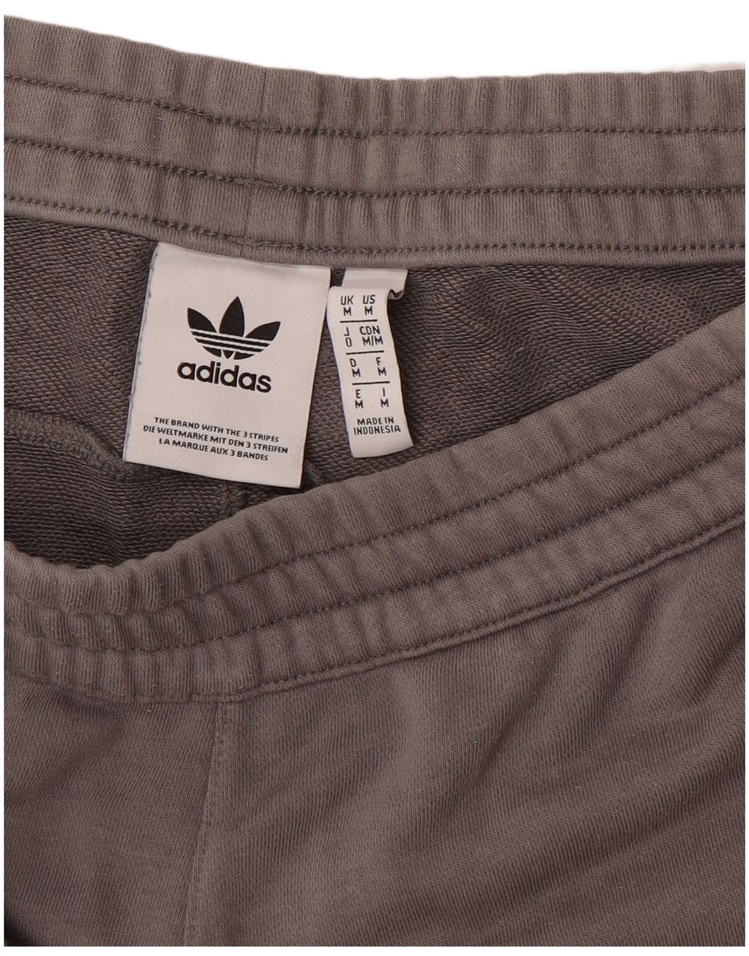 Pantaloncini sportivi Adidas da uomo di colore grigio medio