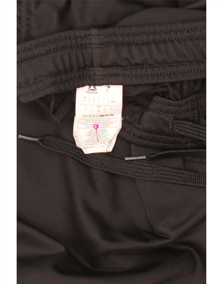 Pantaloni da tuta da uomo Reebok Joggers Large Nero Poliestere
