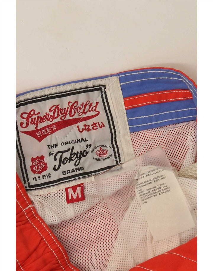 Pantaloncini da bagno con grafica da uomo Superdry Poliestere color block arancione medio
