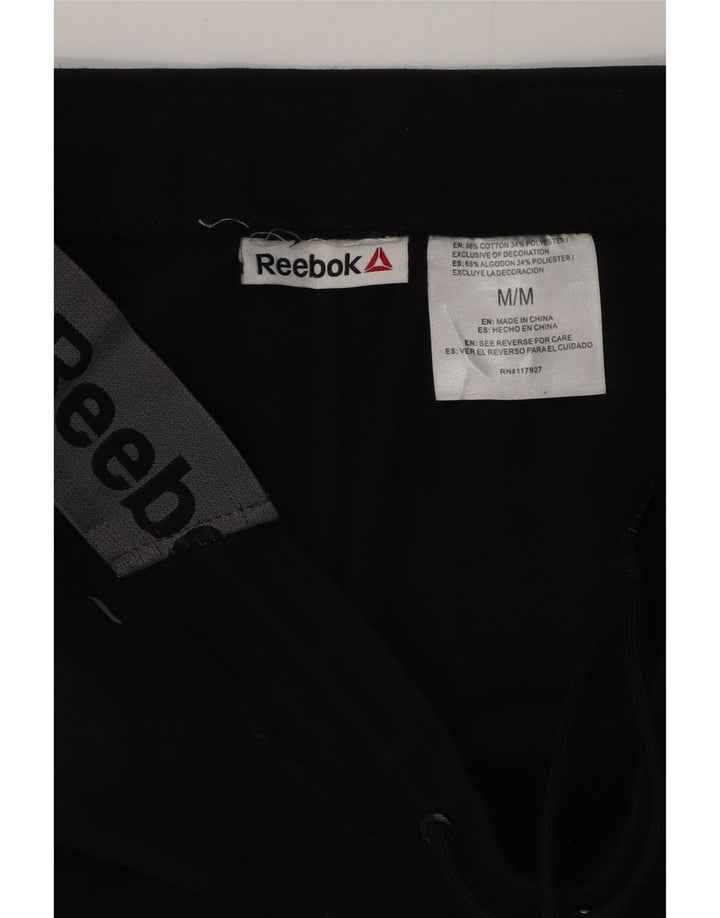 REEBOK Pantaloni da tuta con grafica da uomo Joggers Medium Black Colourblock