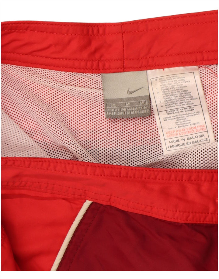Pantaloncini da bagno Nike da uomo in nylon color block rosso medio