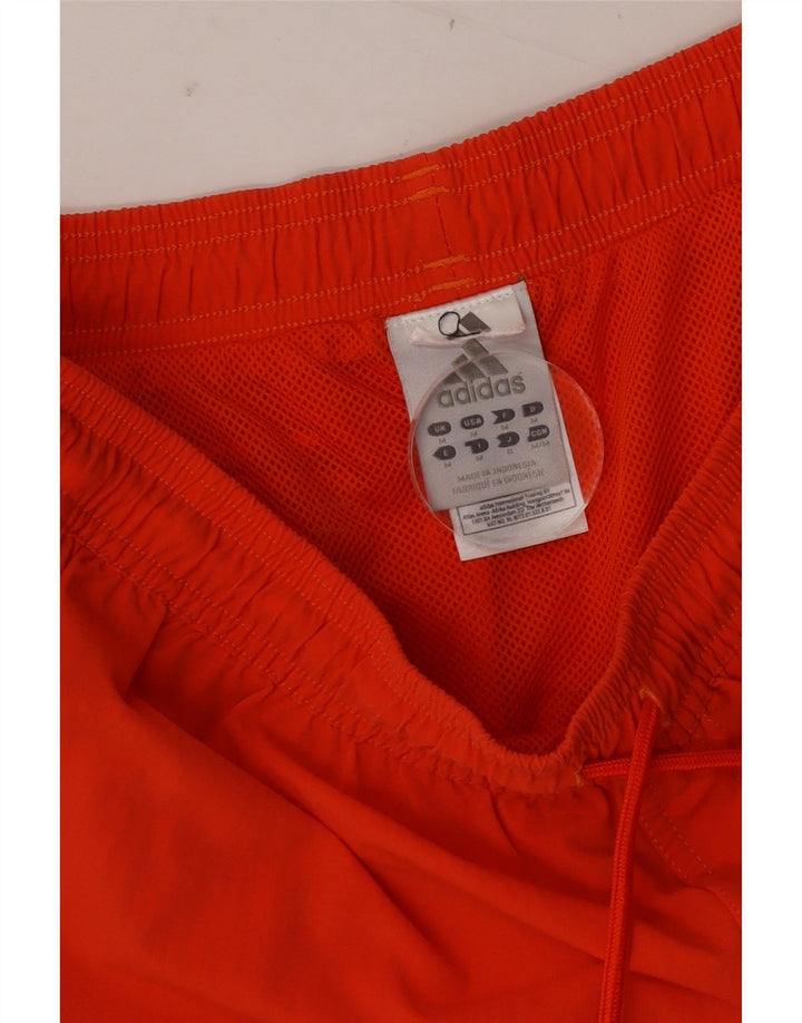 Pantaloncini sportivi Adidas da donna UK 12 nylon arancione medio