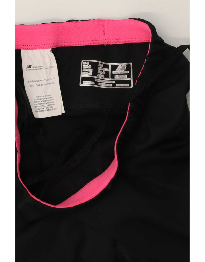 Pantaloni da tuta New Balance da donna Capri UK 12 poliestere nero medio