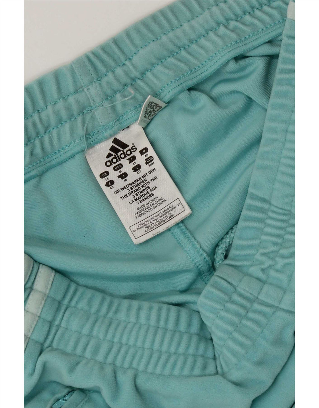 Pantaloni da tuta da donna Adidas Joggers UK 14 Medium Turchese Poliestere