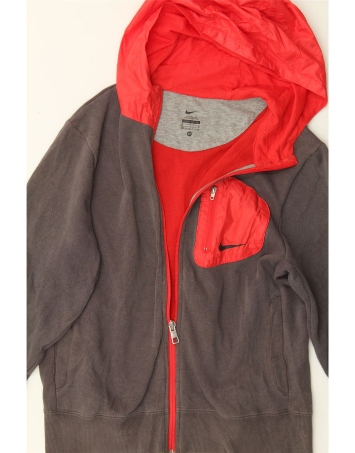 NIKE Boys Graphic Zip Hoodie Sweater 10-11 Years Medium  Grey Colourblock Vintage Nike and Second-Hand Nike from Messina Hembry 