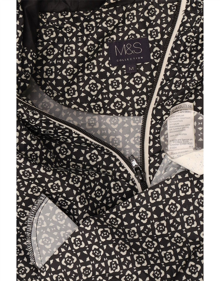 Impermeabile con cappuccio da donna Marks & Spencer UK 14 medio nero geometrico