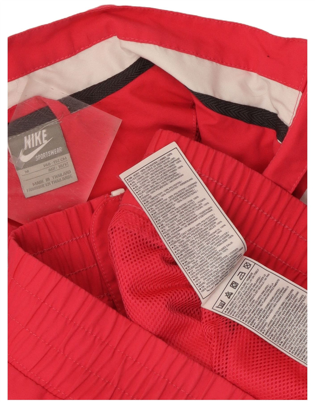 Giacca superiore della tuta da ragazza Nike 10-11 anni color block rosa medio