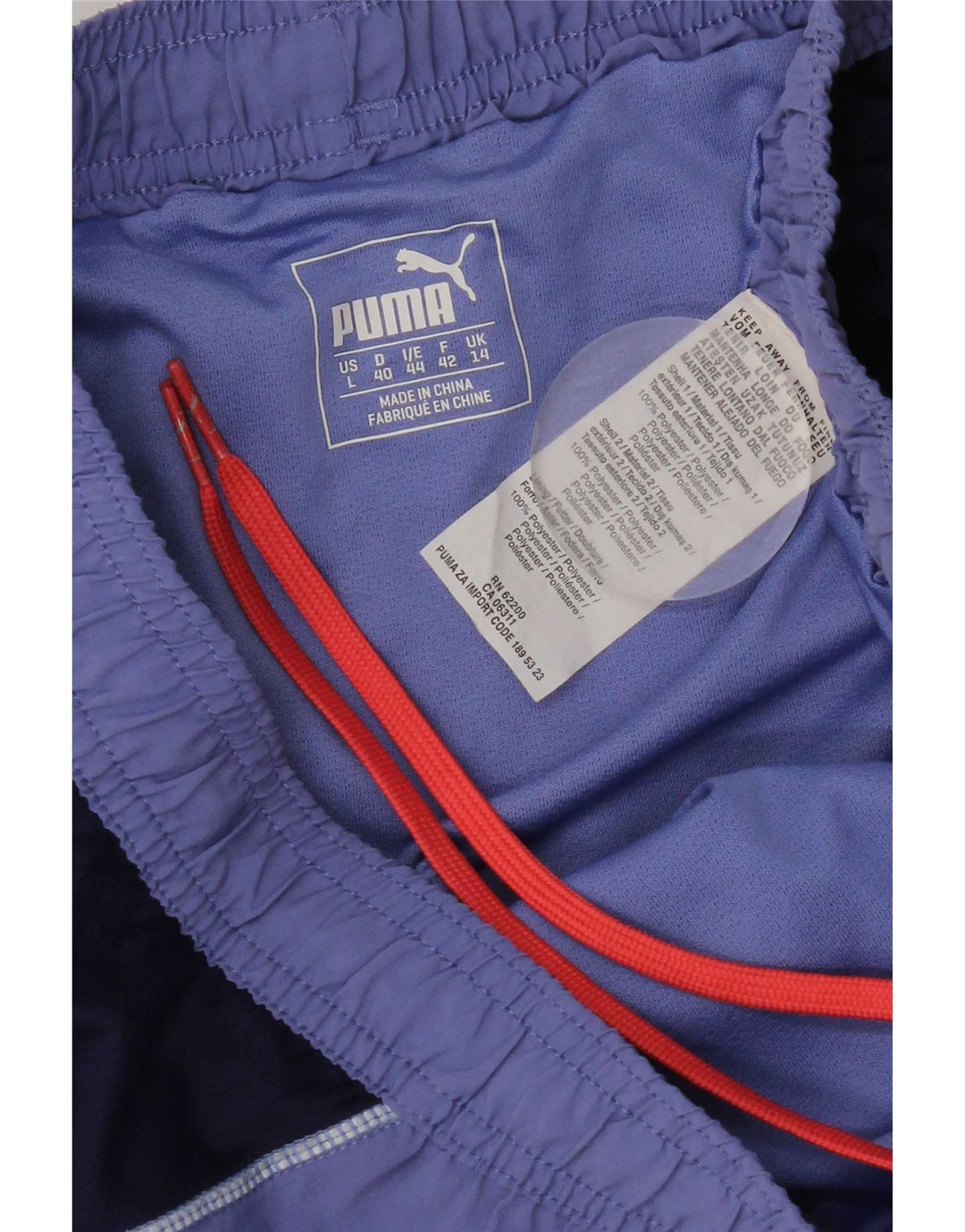 Pantaloncini sportivi da donna Puma UK 14 Large Viola Colourblock Poliestere
