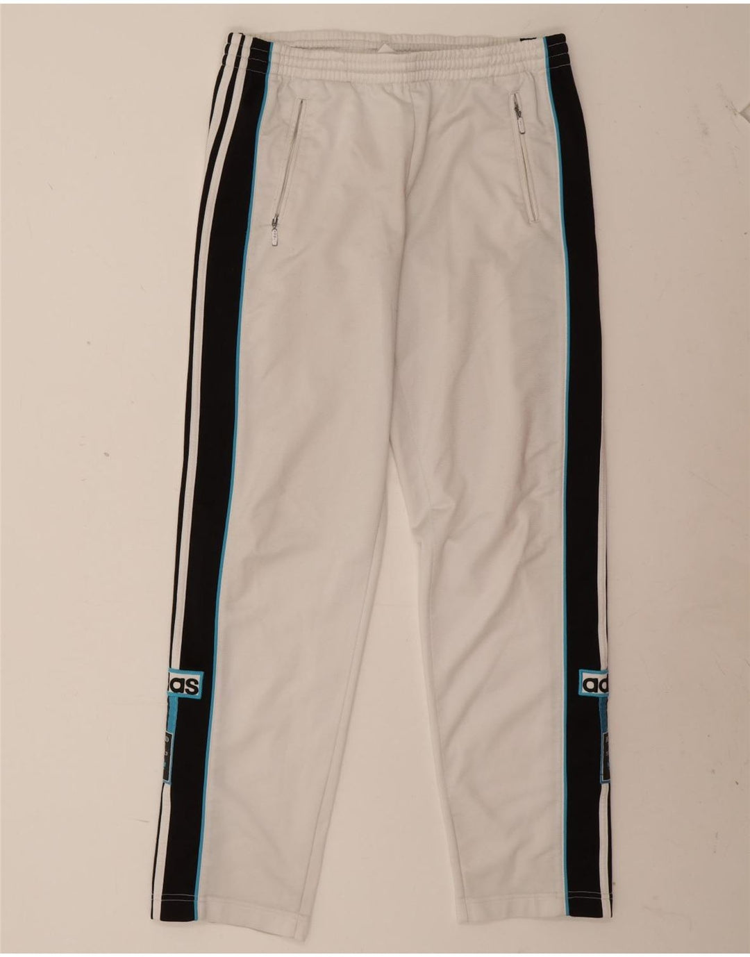 Pantaloni da tuta grafica da uomo Adidas in poliestere color block bianco medio