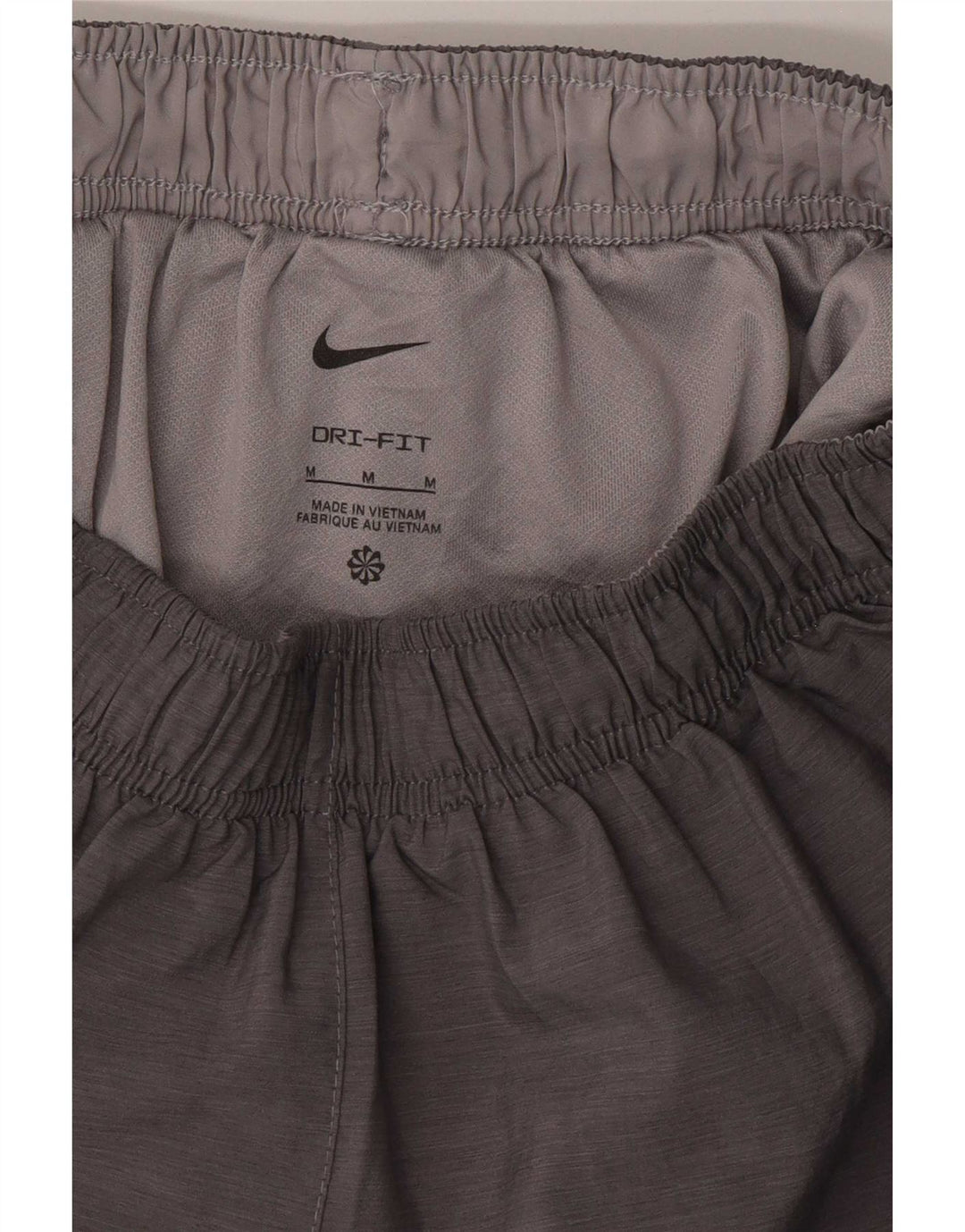 Pantaloncini sportivi da donna Nike UK 12 Poliestere color block grigio medio